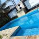 Casa com pisicna in Mongaguá, Mongaguá - Photo 1