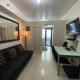 SEA Residences MOA - Bj's Staycation, Manila - Fotografie 10