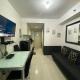 SEA Residences MOA - Bj's Staycation, Manila - Fotografie 9