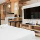 Comfy and Minimalist Studio Apartment at Tuscany Residences By Travelio