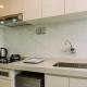 Well Furnished and Comfy Studio Sky House BSD Apartment By Travelio, Tangerang - Fotografie 10