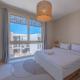 Coastal Vibe 2BR Mangroovy Gouna with Rooftop Cinema, BBQ, Pool & Beach Access, ハルガダ - 写真 2