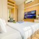 Modern Look 2BR at Puri Garden Apartment By Travelio Jakarta - Photo 3