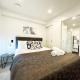 Serene Cityscape Haven AC 1B VS Pool Gym & Sauna, Auckland - Fotografie 10