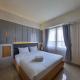 Best Place and Cozy Studio at Altuz Seturan Yogyakarta Apartment By Travelio, Seturan - Fotografie 1