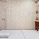 Cozy 2BR at Royal Makassar Apartment By Travelio, Pampang - Fotografie 7