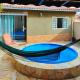 Casa Temporada Espaço Sara com Área Gourmet Fogão a lenha,forno, Churrasqueira e Piscina Totalmente Privada a 5min do Centro e do Parque das Águas, サン・ロウレンソ - 写真 1