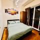 2BR Penthouse with BGC view, boardgames, videoke, Manila - Fotografie 2