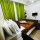Two Palm Tree Villas Condominium - Studio 1O with Balcony - Across Terminal 3 Airport, Манила - Фото 2
