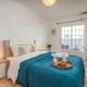 Bright & Cozy House with Terrace by HostWise, Conceição