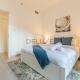 Balcony Overlooking the Swimming Pool, Just Minutes from the Park, Town Square Safi 1A, Al Yelayiss 2 by Deluxe Holiday Homes, Dubaj - Fotografie 6