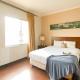 1BR Queen Bed at Marina Ancol Apartment near Dufan By Travelio Yakarta - Foto 1