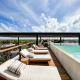 Rooftop Paradise 2BR in Gated Community