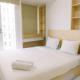 New and Nice Designed Studio at Tokyo Riverside PIK 2 Apartment By Travelio, Rawalembang - Photo 1