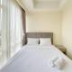 Nice and Minimalist 2BR at Menteng Park Apartment