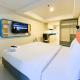 Modern Look Studio Apartment at Marquis de Lafayette By Travelio, Semarang - Fotografie 5