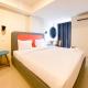 Modern Look Studio Apartment at Marquis de Lafayette By Travelio, Semarang - Fotografie 1