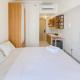 Chic and Cozy Studio at Tokyo Riverside PIK 2 Apartment By Travelio, Rawalembang (photo 6)