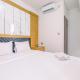 Modern and Comfort 2BR Transpark Cibubur Apartment By Travelio, Depok - Fotografie 1