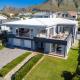 164 at Beach Road - large family home with ocean views Kleinmond - Foto 1