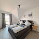 Ferienwohnung KÖÖK Heimathafen - Modern, Balkon, Strandnah, Neuharlingersiel - Photo 6