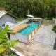 Casa Rústica com Piscina Privativa, Banheira de Hidromassagem, Ar-Condicionado, Pet friendly - Refúgio na Natureza a 5 Minutos do Centro de Imbituba, Perfeita para Famílias e Grupos, 因比图巴 - 照片 10