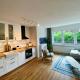 Townhouse Am Kurpark - Top bewertet von Familien! Ruhig, zentral - mit Terrasse, Parkplatz, Grill, Retro Arcade, Wallbox, und inklusive Wäschepaket, Braunlage - Foto 3