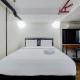 Spacious 2BR Loft at Brooklyn Alam Sutera Apartment By Travelio Tangerang - Photo 1