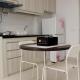 Warm and Cozy Studio at Azalea Suites Apartment By Travelio, Cikarang (Foto 6)