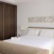 Warm and Cozy Studio at Azalea Suites Apartment By Travelio, Cikarang (Foto 9)