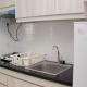 Warm and Cozy Studio at Azalea Suites Apartment By Travelio, Cikarang (Foto 4)