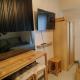 Cozy Wooden Design Studio Condo Unit at Studio 7 Edsa, Manila - Fotografie 8