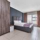 Spacious 2BR Apt in Central Sandton with WiFi , Gym and Pool, Йоханнесбург - Фото 8