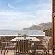 Aura Seafront Villa, Neon Oitilon