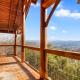 Gorgeous 4 bedroom with nonstop mountain views, hot tub, movie room, and games!