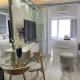 Condo in Bel- Air Arthur's Suites at Air Res skyline view, Manila - Fotografie 9