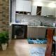 luxurious one bedroom apartment with fully equipped gym swimming pool private parking and scenic city views, Nairobi - Foto 7