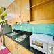 Shell Residence 1BR Deluxe Room Across Mall of Asia and Near Airport, Manila - Fotografie 7