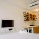 Relaxing Designed Studio at Tokyo Riverside PIK 2 Apartment By Travelio, Rawalembang (photo 4)