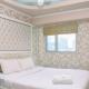 Nice and Homey 1BR at The Wave Kuningan Apartment By Travelio