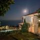 Stone house 1883 Kymi with pool, Enoría