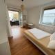 HYGGE - 100qm Wohnung in bester Lage mit Parkplatz und Balkon Greifswald - Fotografie 9