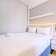 Homey and Modern Look 2BR Transpark Cibubur Apartment By Travelio, Depok - Fotografie 1