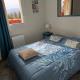Appartement 3 étoiles, 2 chambres , cuisine aménagée, terrasse, face à la chaîne des Pyrénées, Bagnères-de-Bigorre (zdjęcie 8)