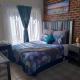 Lovely 1-bedroom in secure complex with pool