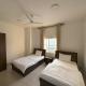 أجنحة هومينج ــ Homing Suites, Salala (zdjęcie 8)