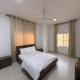 أجنحة هومينج ــ Homing Suites, Salala (zdjęcie 9)