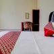 OYO 90945 Arizon Kost, Jambi (Foto 8)