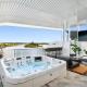 Stunning Rooftop Retreat with Private Jacuzzi on the Maroochy River