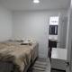 Basement two Queen beds and one single with two full washrooms by YKF airport